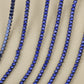 chaine de strass en bleu roi-saphir a griffe bleu