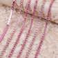 chaine de strass rose-poudrée a griffe rose