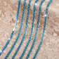chaine de strass en turquoise-bleu zircon a griffe turquoise 