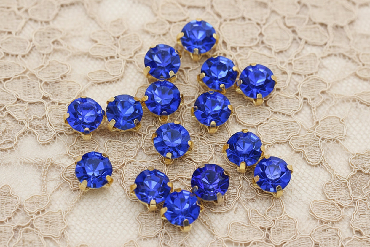strass bleu égyptien ,griffe en métal doré a coudre