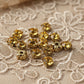 strass jaune doré, griffe en métal doré a coudre 
