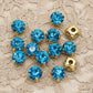 strass turquoise azur, griffe en métal doré a coudre