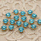 strass turquoise pastel, griffe en metal doré a coudre